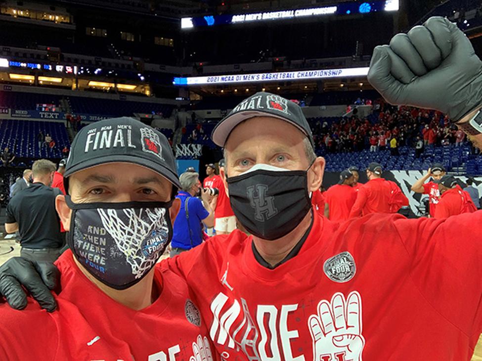 Photo of Paul Shupe, MD, and John Houston, associate athletics trainer at the University of Houston, celebrating the Cougars heading to the Final Four. (Photo courtesy of Paul Shupe, MD)