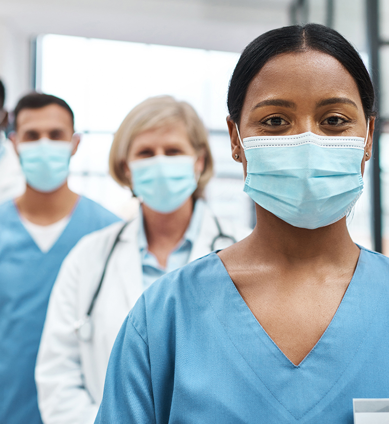 Three nurses wearing masks, courtesy Getty Images